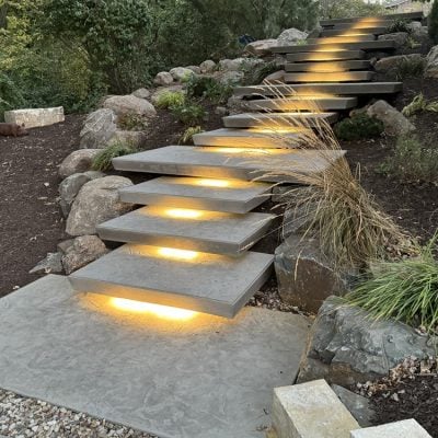 Floating concrete steps stamped with seamless skins. Installation by Dan Powers. 